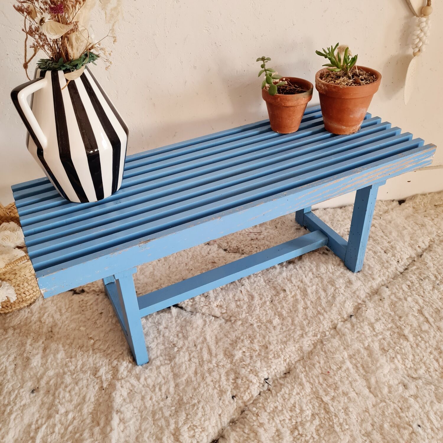 Old bench with blue slats