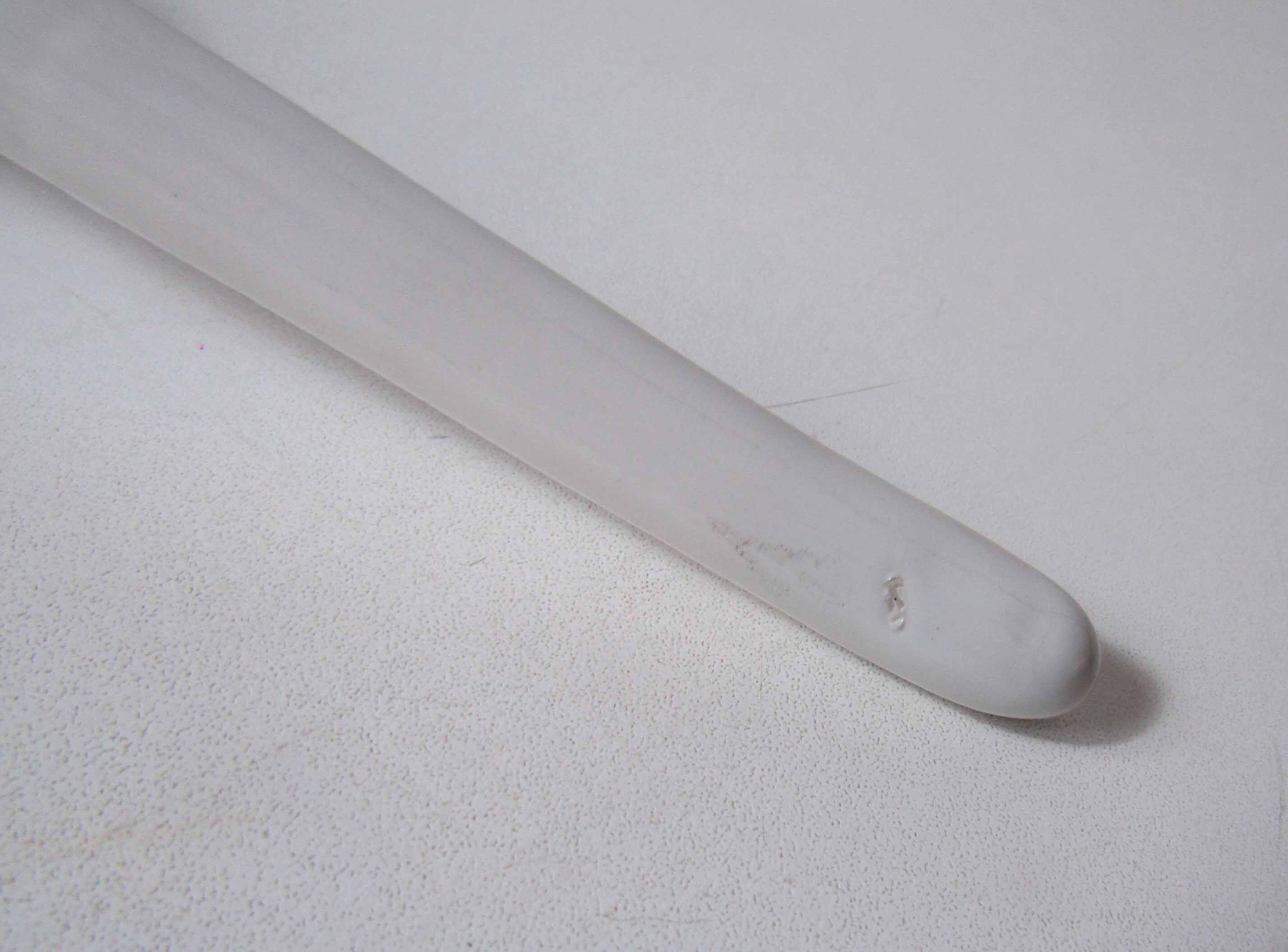 Ladle in white ceramic