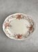 Plat en terre de fer polychrome « Wentworth » Bishop & Stonier
