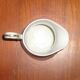 Pitcher in Limoges porcelain, barbel decoration