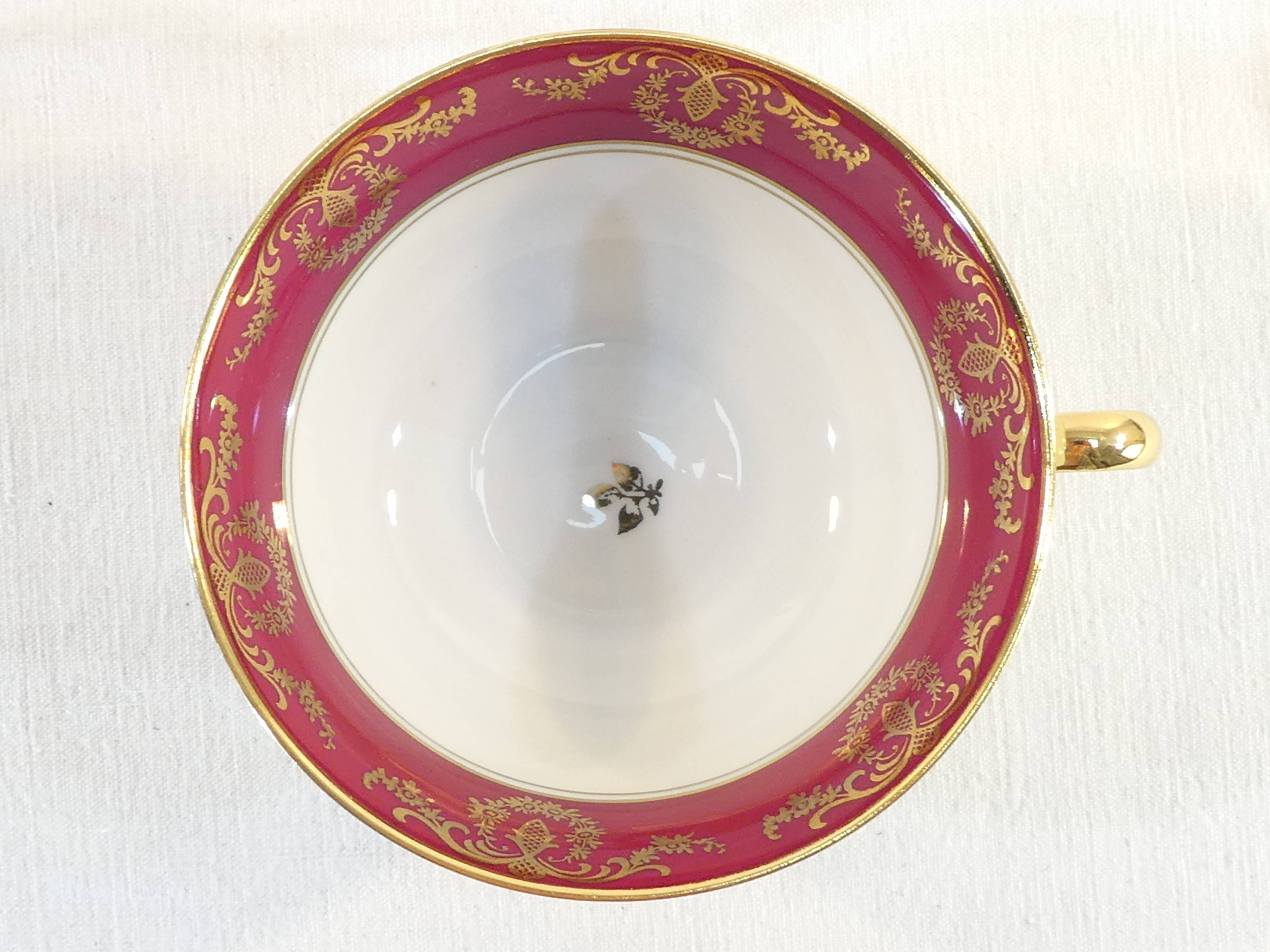 Pair of lunch cup and subcup in porcelain limoges red headband