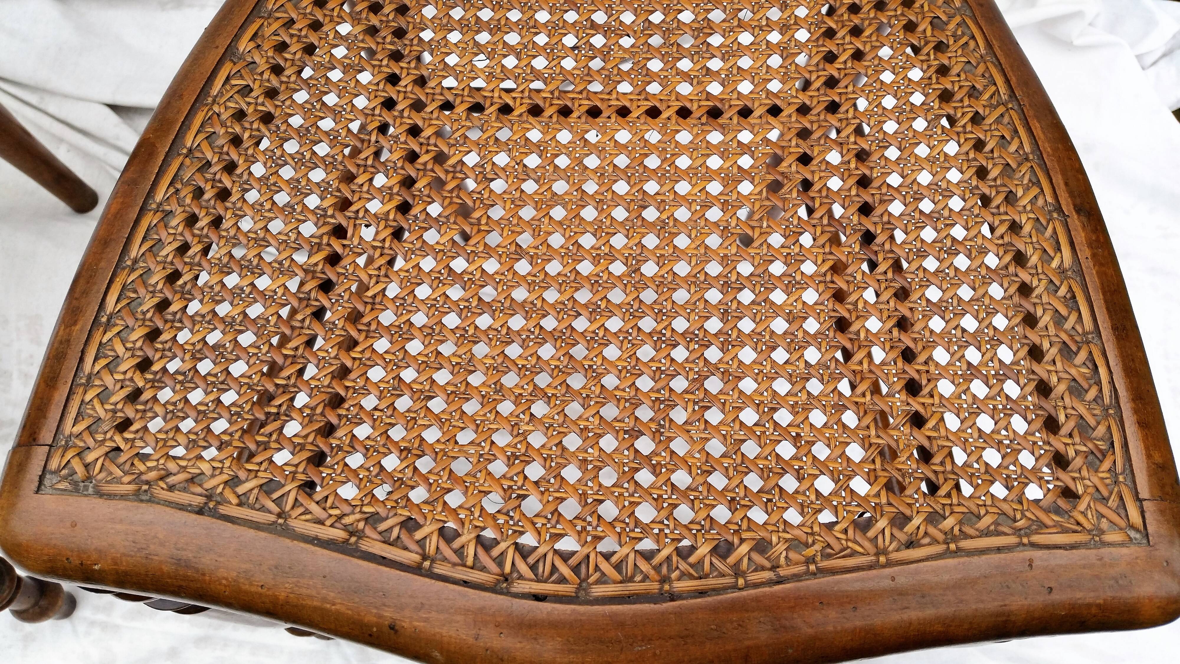 Pair of 2 old cane chairs