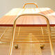 Vinyl service in gilded metal, with wooden top