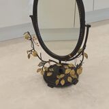 Table mirror, tilting psyche in patinated bronze decorated with leaves and fruits