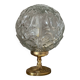 Textured round globe table lamp with a gold brass base