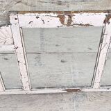 Old arched mirror in Burmese teak