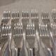 11 silver-plated fish forks and 11 fish knives by Christofle Vendome