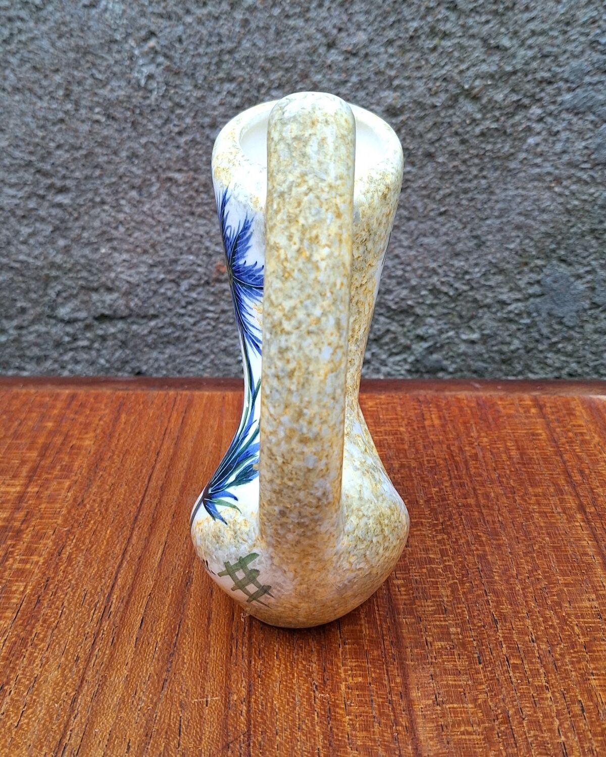 Earthenware vase signed by Jacqueline Gelb with a thistle decoration.