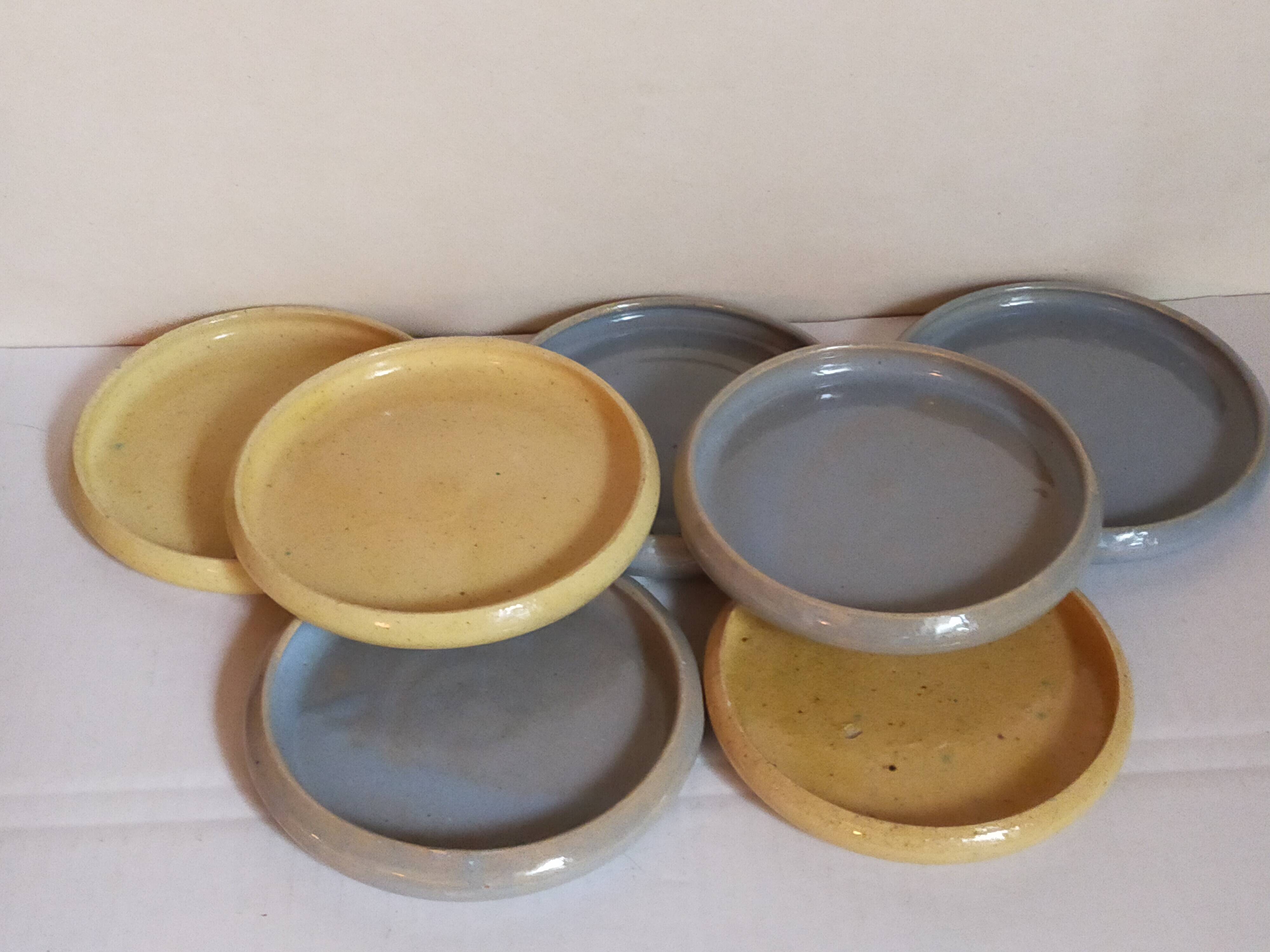 Seven vintage potter's sweet treat plates