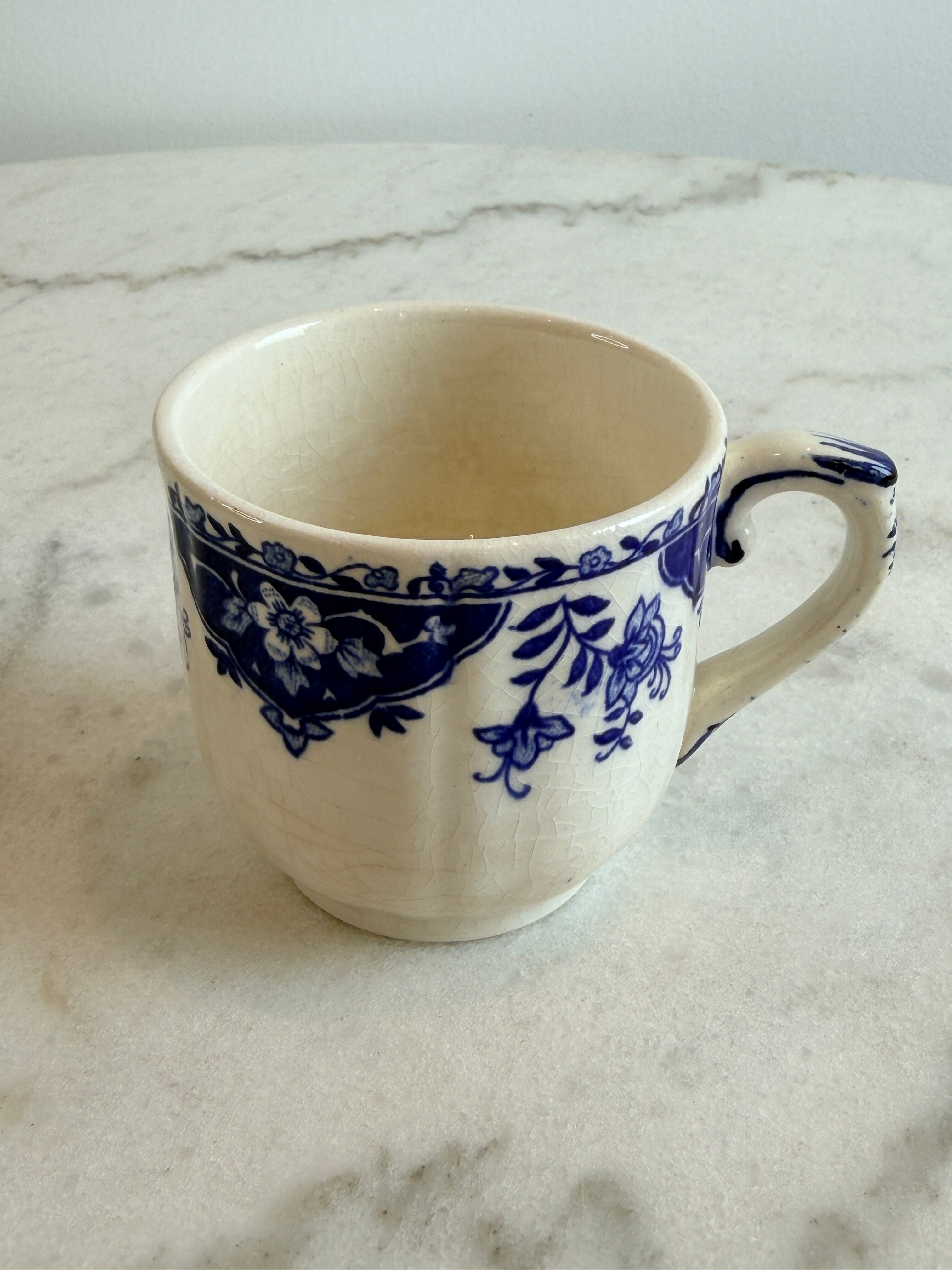 A cup made of ironstone - Gien