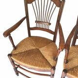 Pair of straw and cherry armchairs