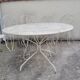 Wrought iron garden furniture from the early 20th century.