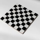 Vintage black-and-white marble chessboard with matching marble pieces, Italian 1960s design, sculptural centerpiece