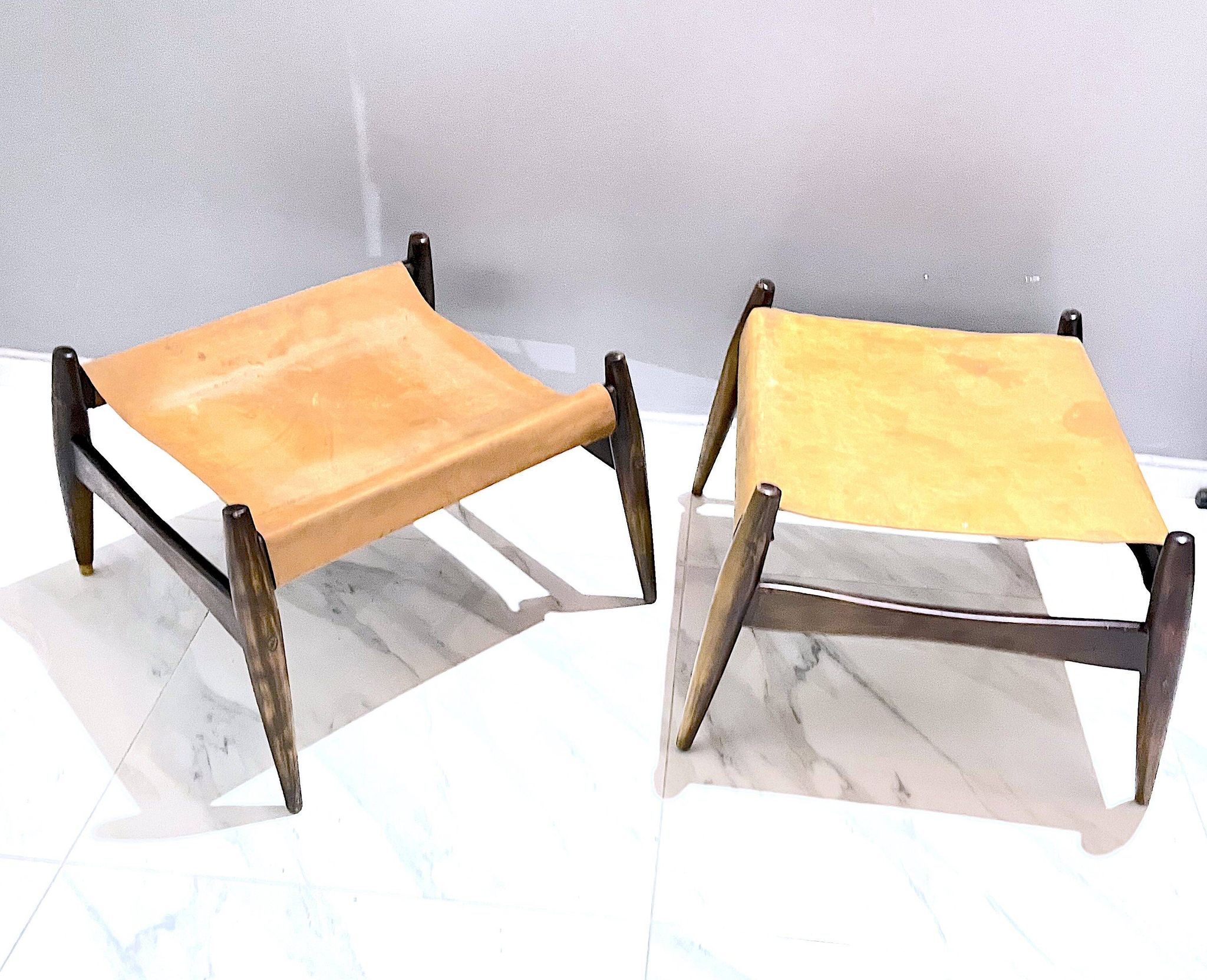 Pair of Ottomans, Rosewood and leather, by Liceu Das Artes e Oficios, Brazil 1960
