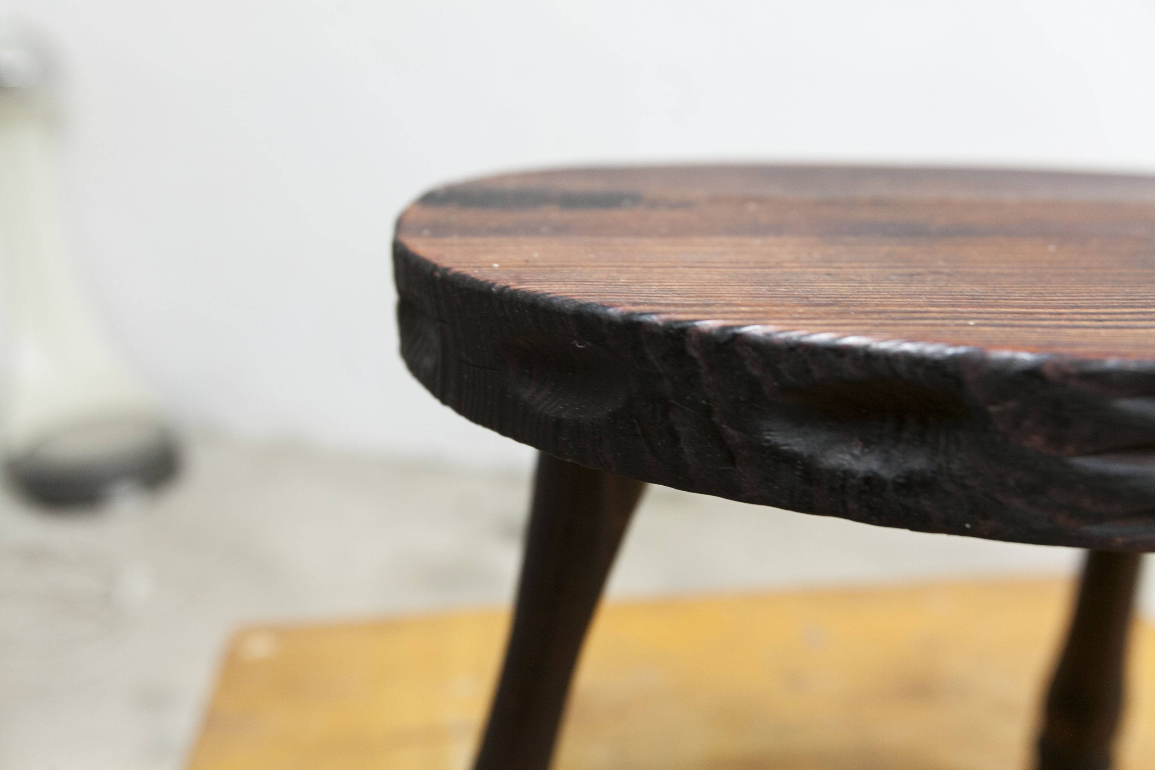 Low brutalist solid wood stool 1950