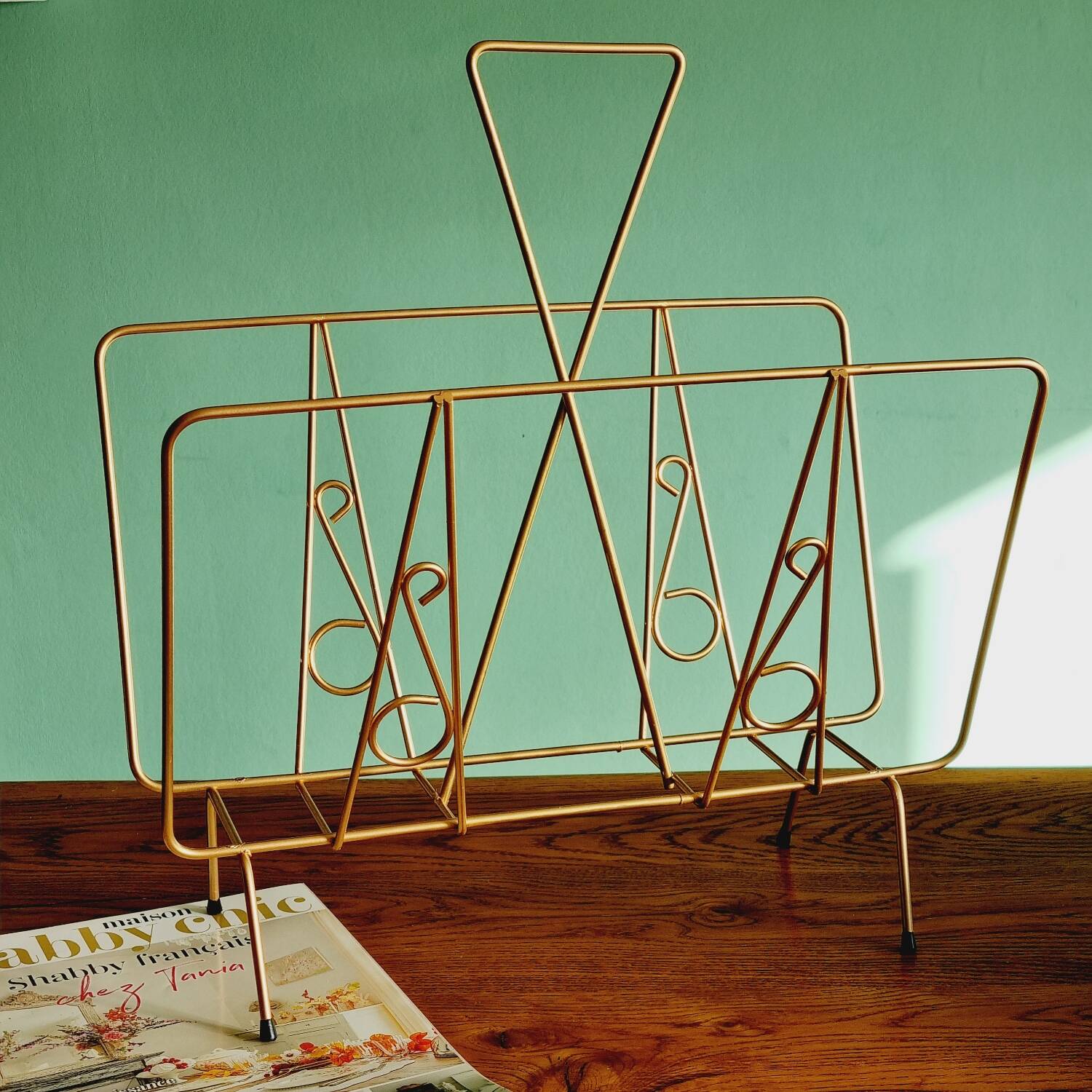 Golden metal magazine holder