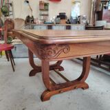 Art Deco extendable table in solid wood and brass.
