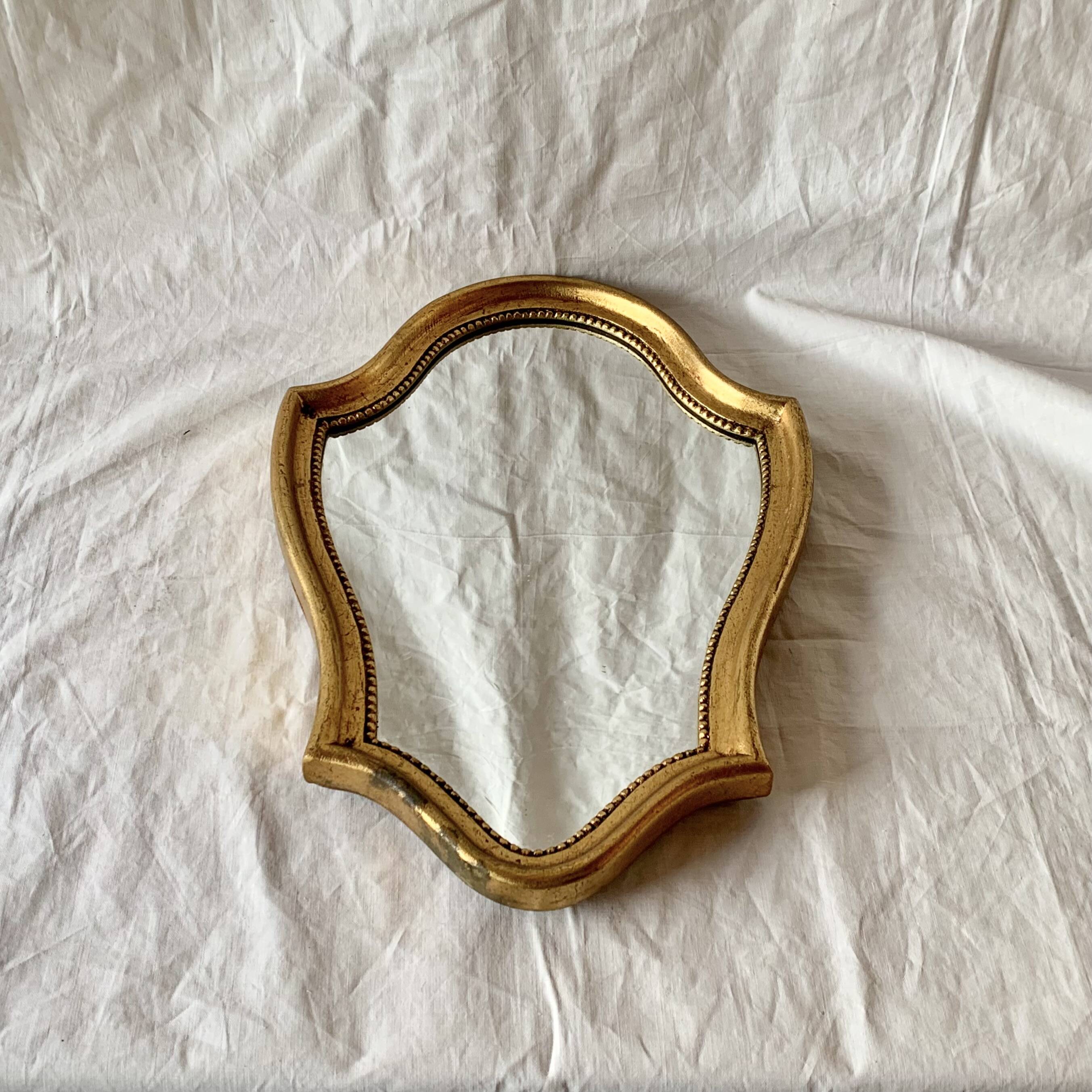 Vintage wall mirror in gilded wood