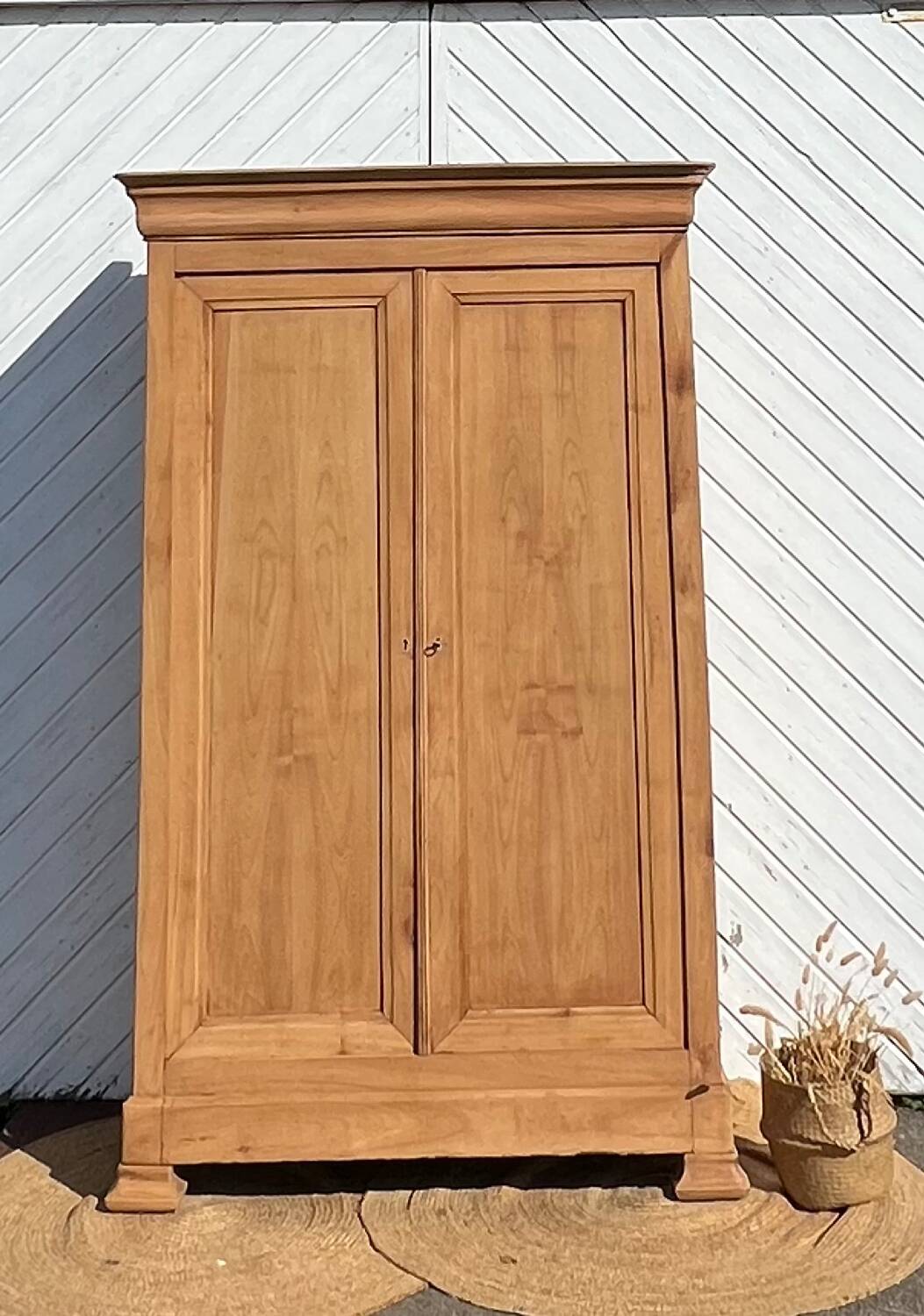 Large antique wardrobe renovated in raw solid wood