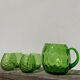 4 green water glasses and vintage blown glass carafe