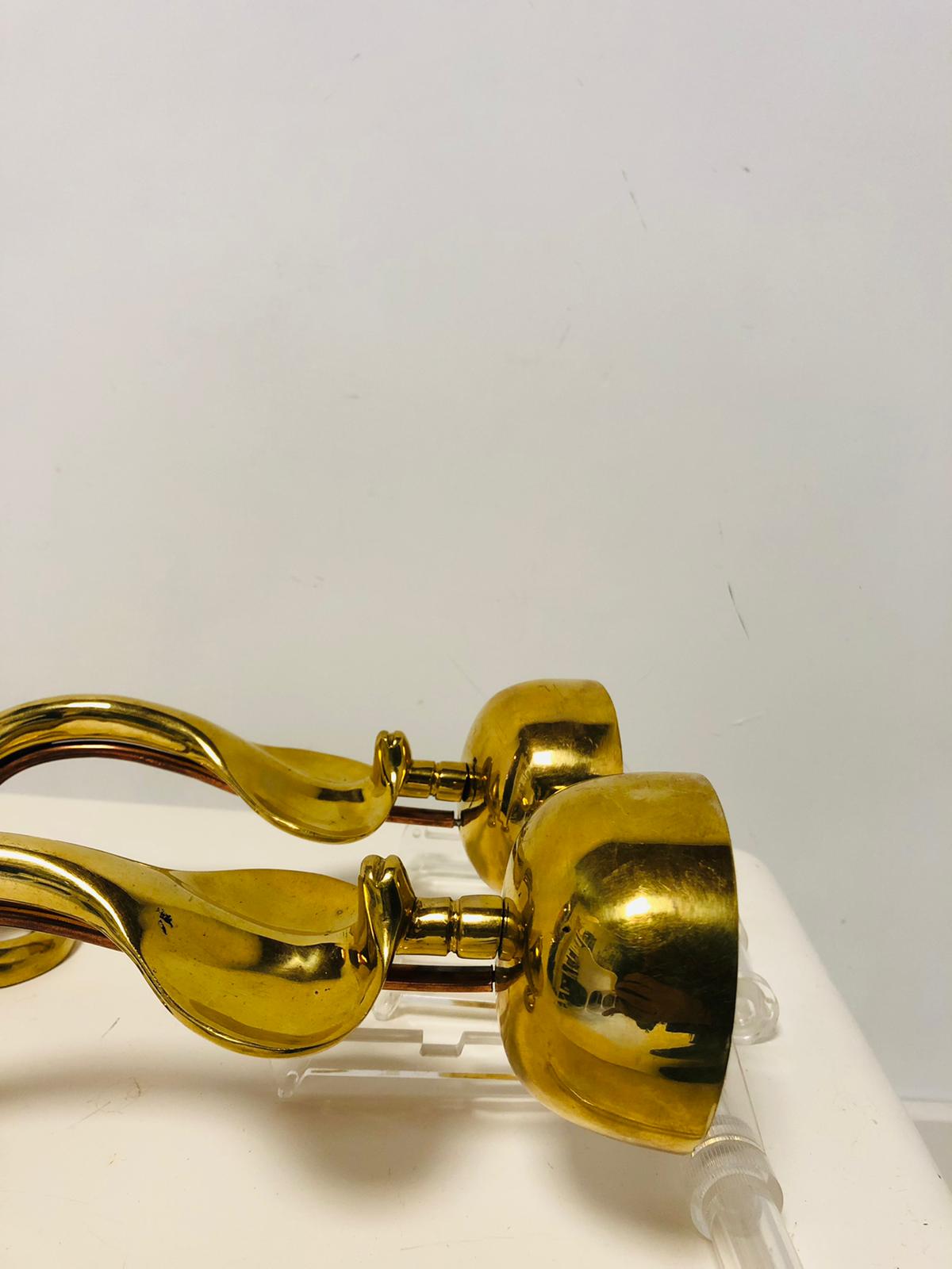Pair of gilded bronze wall lamps