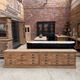 Large workshop furniture transformed into a TV unit.