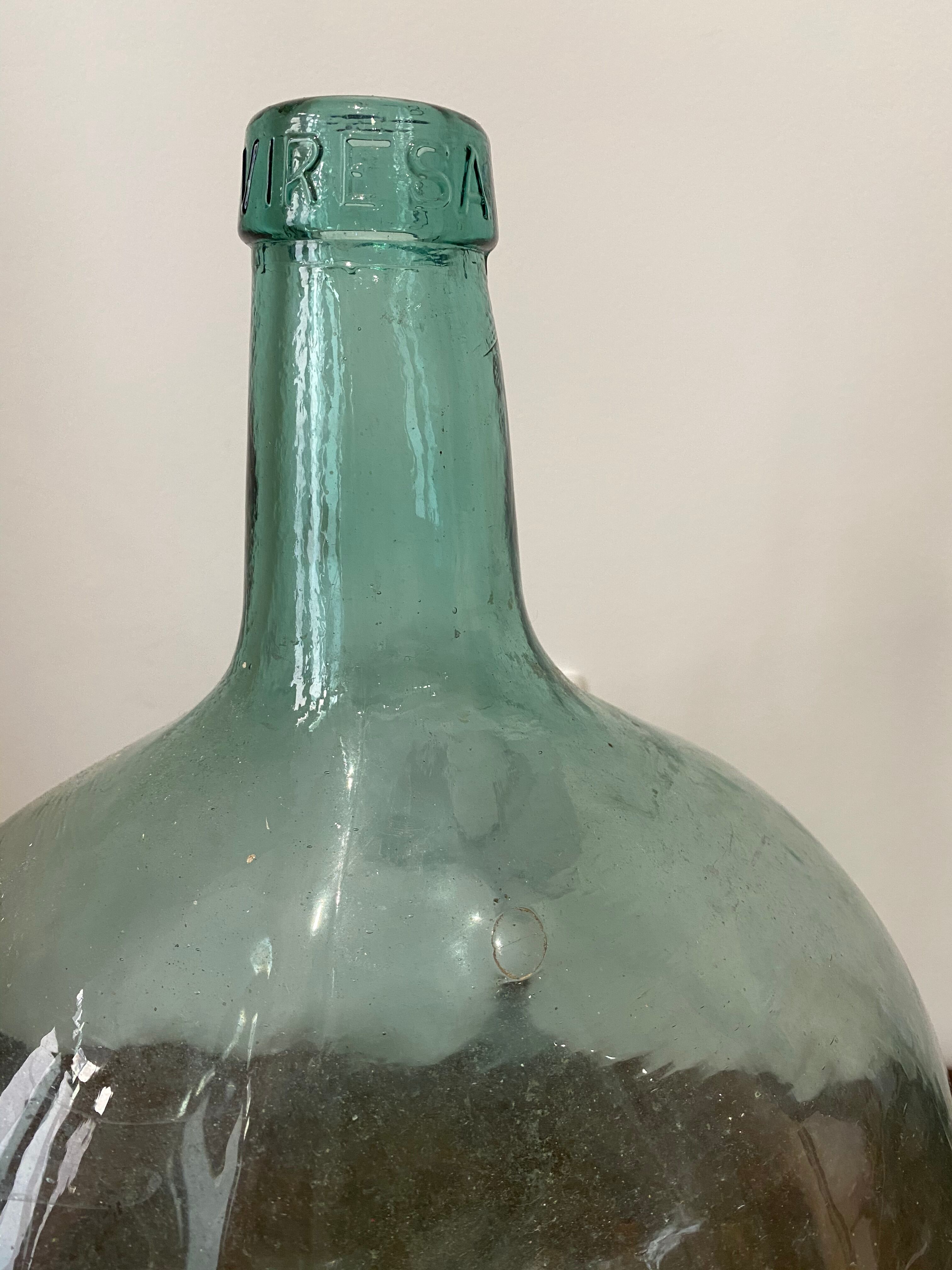 Clear green demijohn