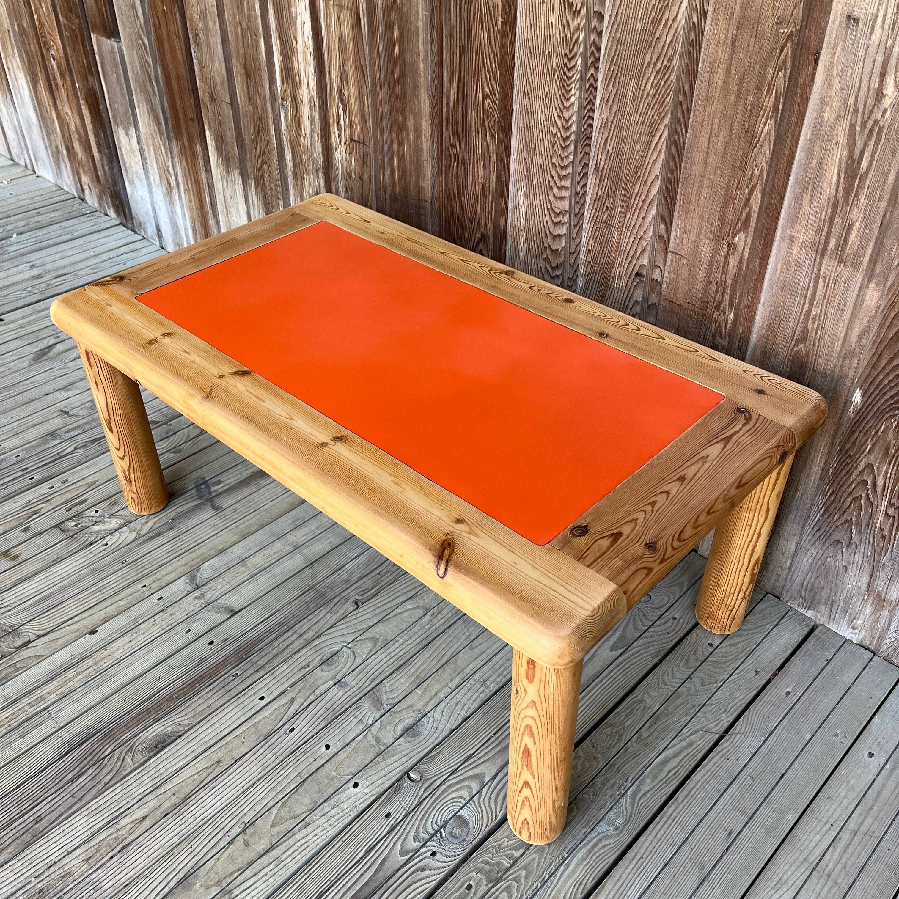 Modernist pine and orange lacquered coffee table, 1970s