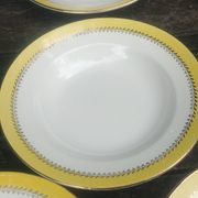 Set of thirteen old porcelain soup plates signed "Biarritz"