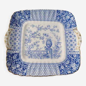 Plate with phosphatic porcelain decoration