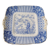 Plate with phosphatic porcelain decoration