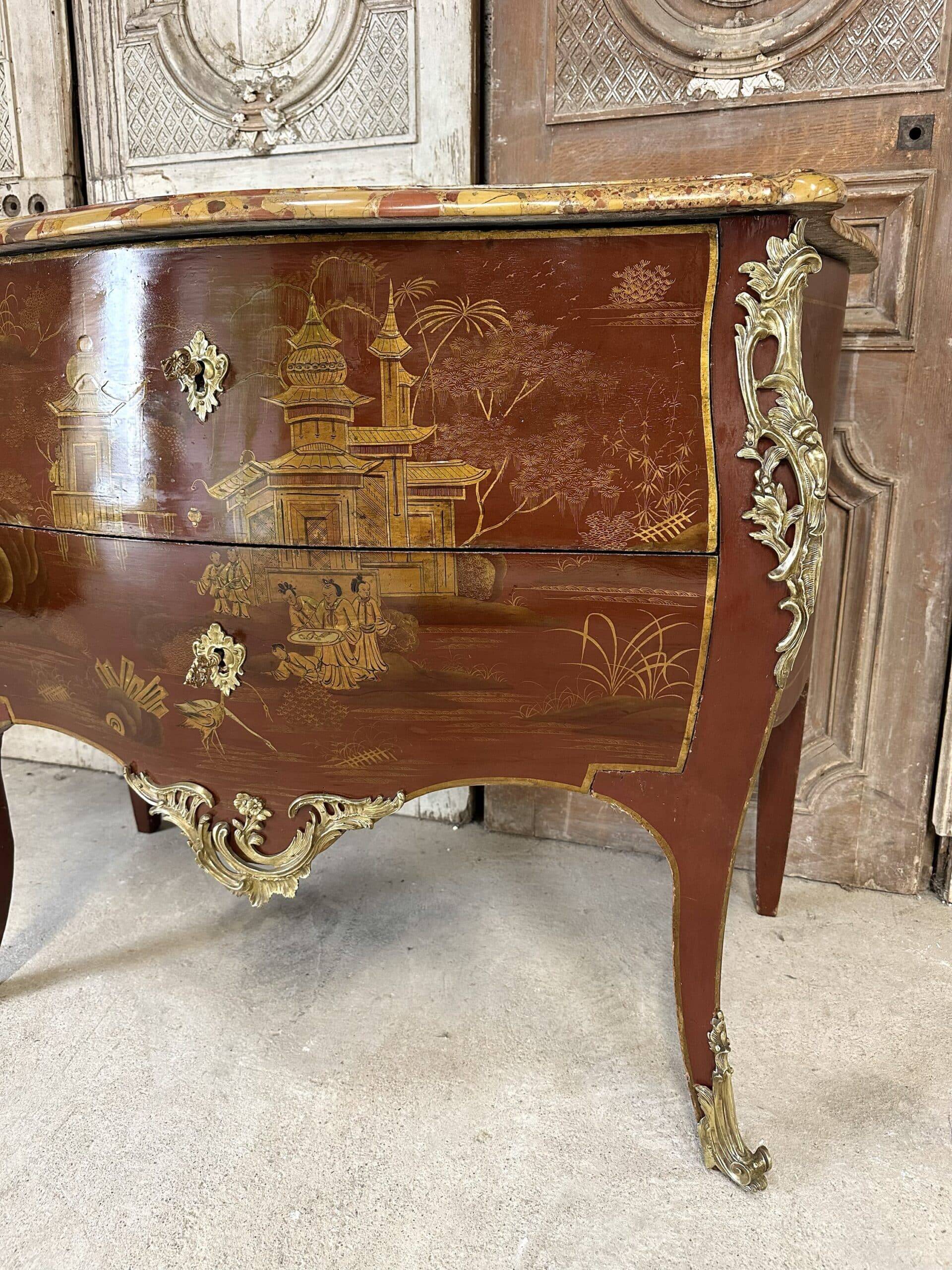 Louis XV style commode in red lacquer from the 1900s.
