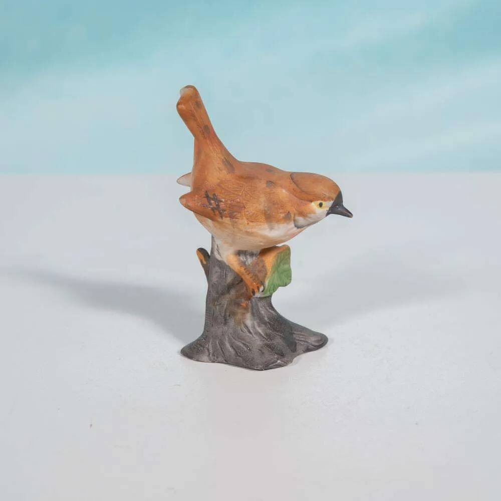 Vintage porcelain bird statuette from the sixties.
