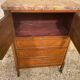 Chest of drawers with 3 drawers and 2 doors, marble top.