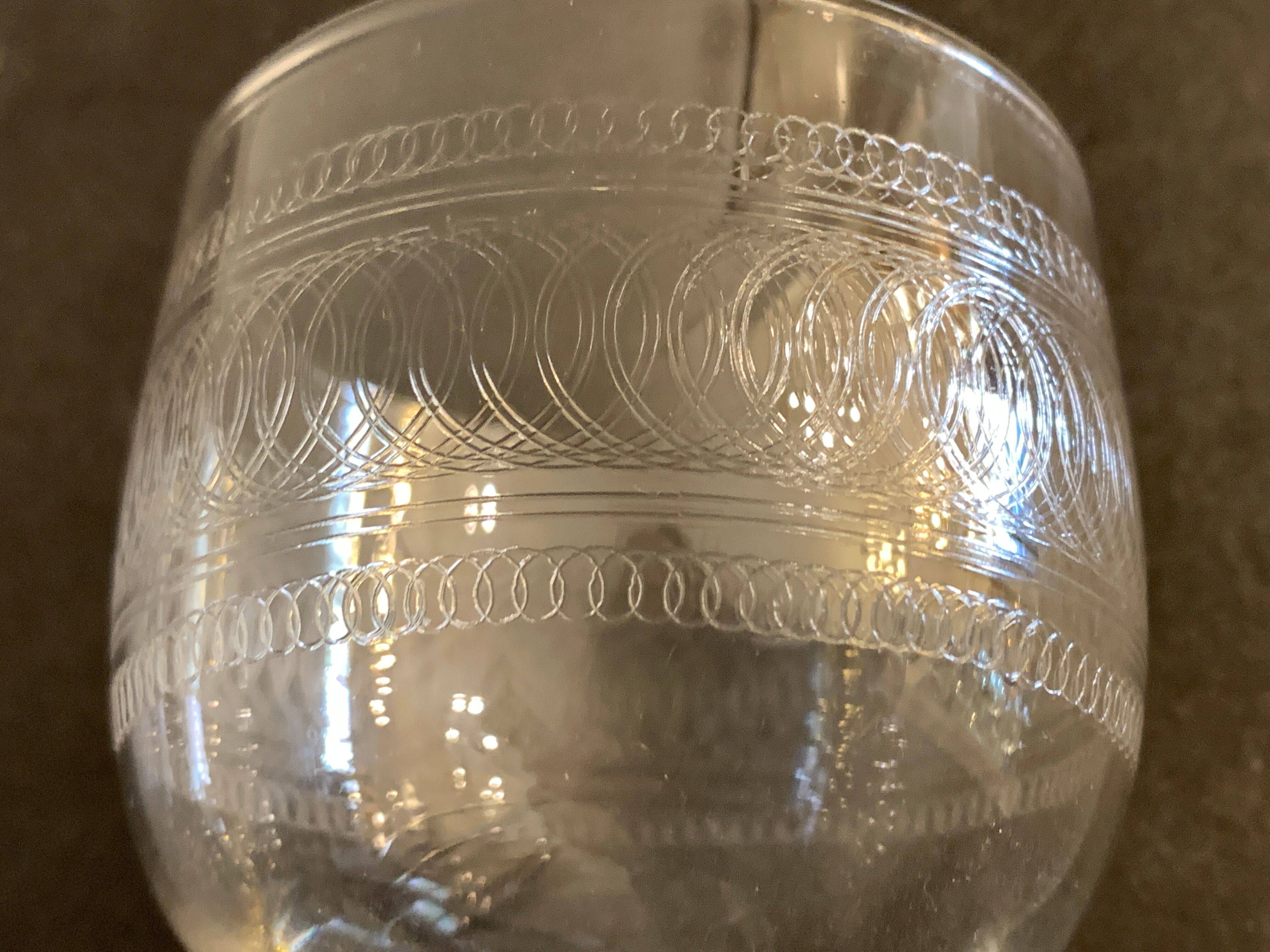 10 blown and engraved stemmed glasses