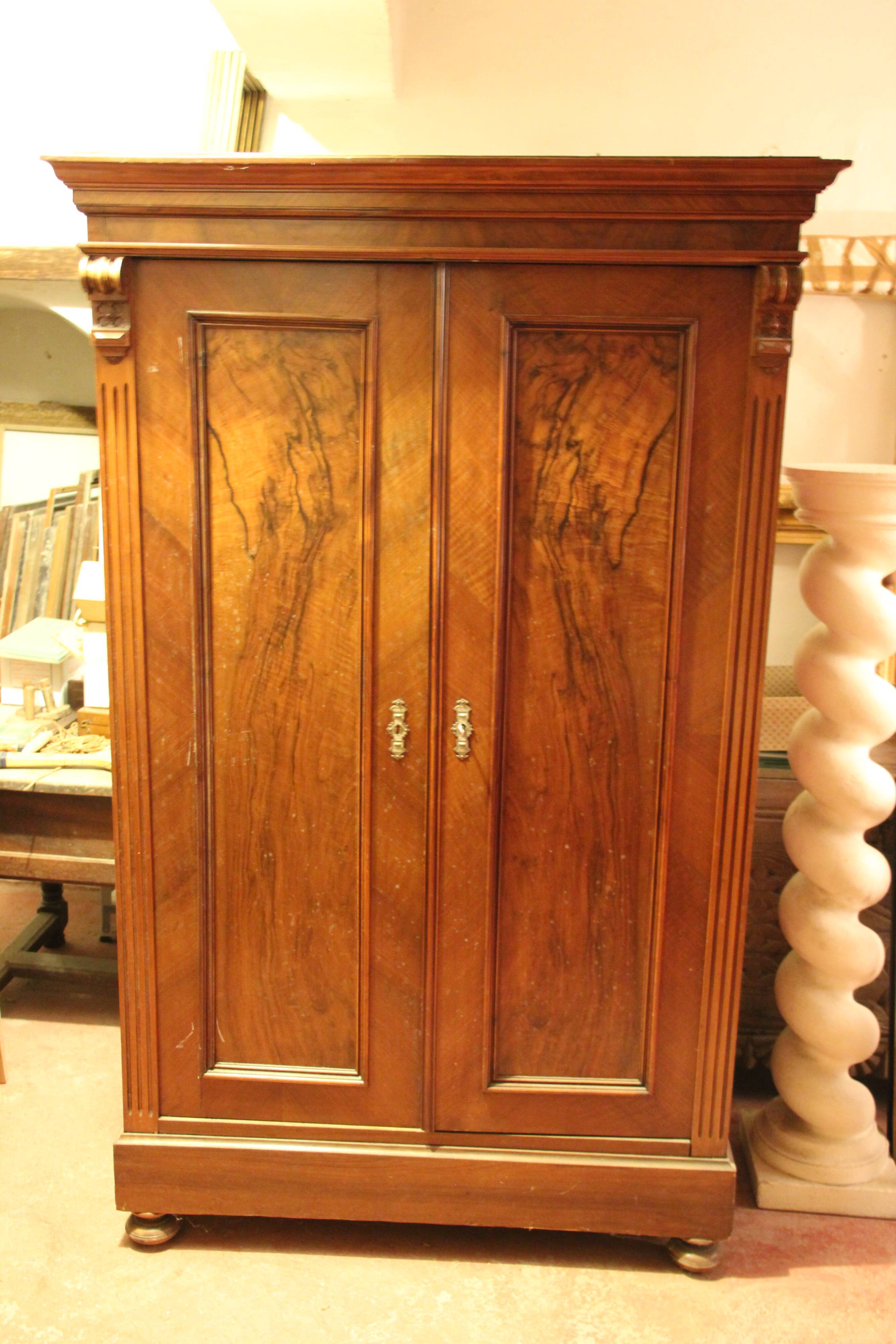 Solid wood cabinet and veneer. early twentieth century