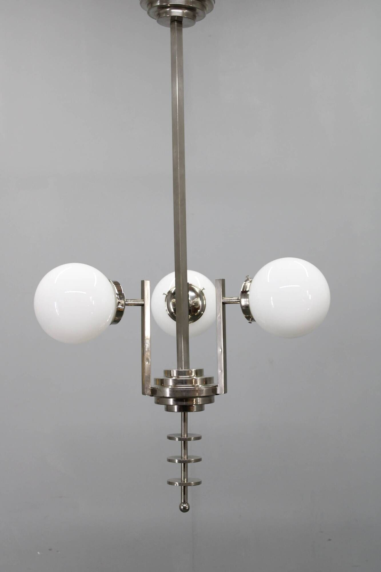 Czechoslovak Art Deco nickel chandelier with three opaline glass globes