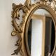 Petit miroir ovale signé Tallandier en laiton doré style Rococo – 30x2