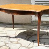 Solid wood table with curved legs