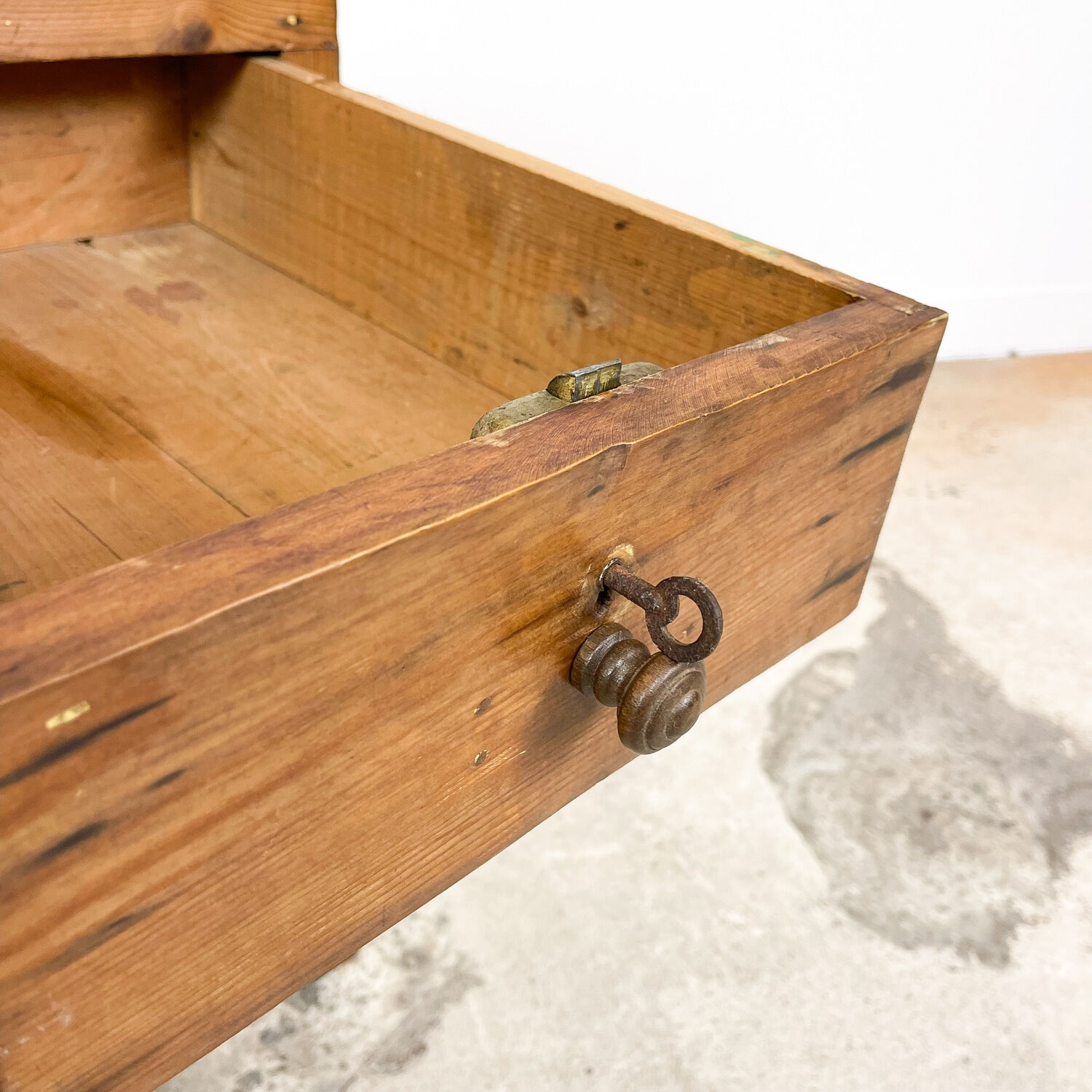 Vintage industrial wooden side table with drawers on casters