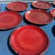 12 Assiettes en céramique sang de bœuf Chinoise des années 1950