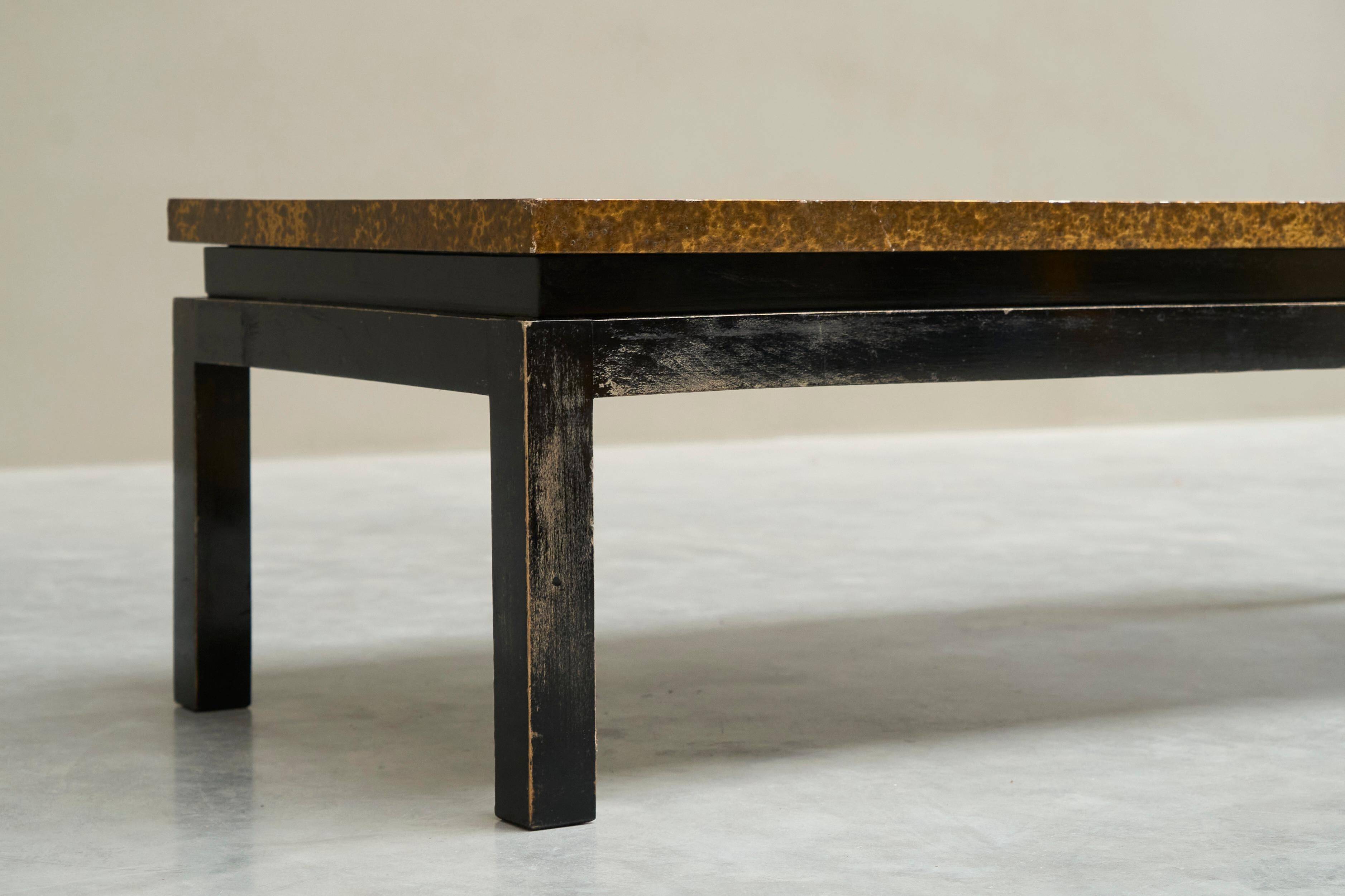Modernist coffee table with a patinated gold top, 120x52.5x36 cm, mid-20th century.