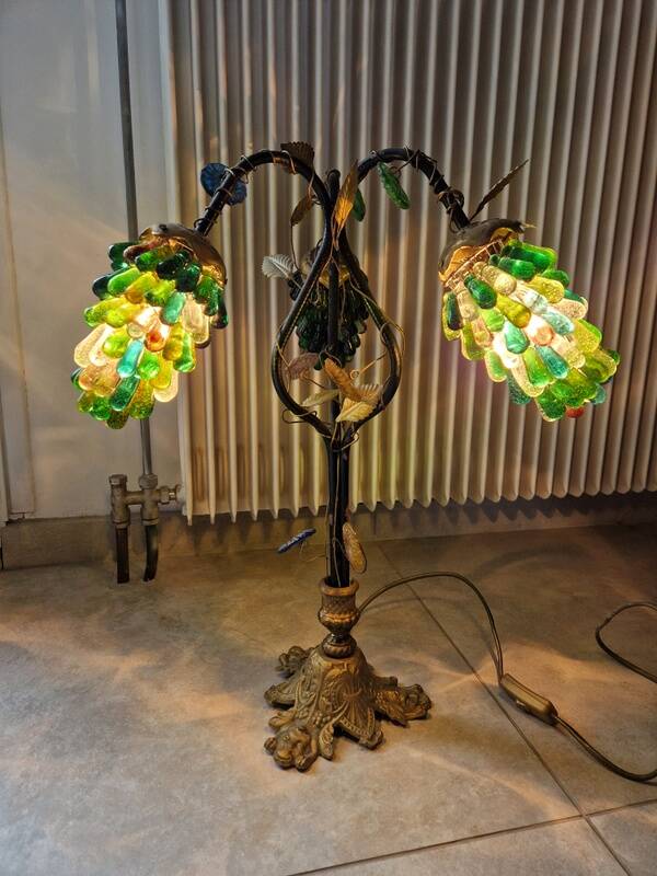 Bronze table lamp and Murano glass grape clusters.