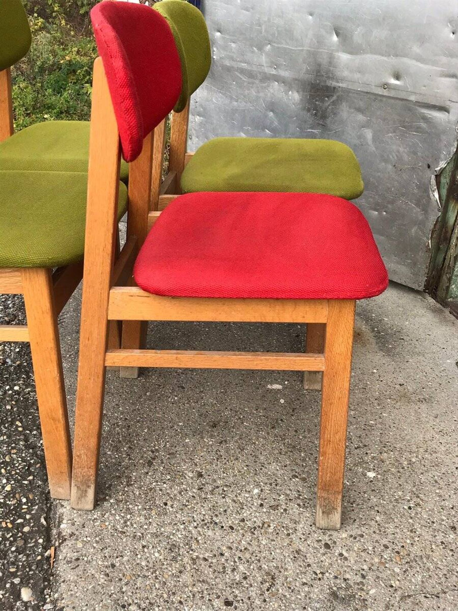 Set of 4 multicoloured wooden office chairs from the 1960s, Mid-Century style, with upholstered seats.