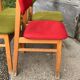 Set of 4 multicoloured wooden office chairs from the 1960s, Mid-Century style, with upholstered seats.