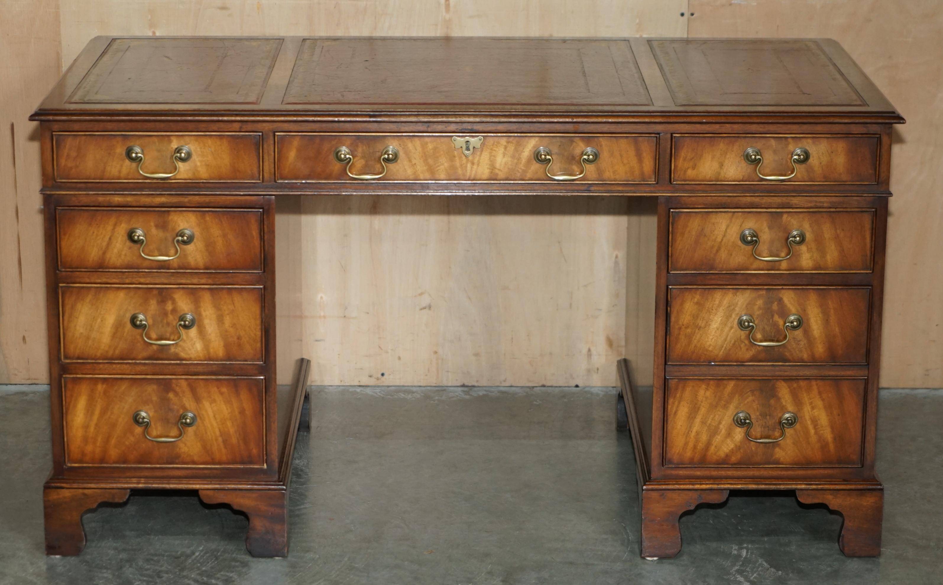 Partner desk Bevan Funnell in hardwood with leather top and gold leaf gilding.
