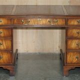 Partner desk Bevan Funnell in hardwood with leather top and gold leaf gilding.