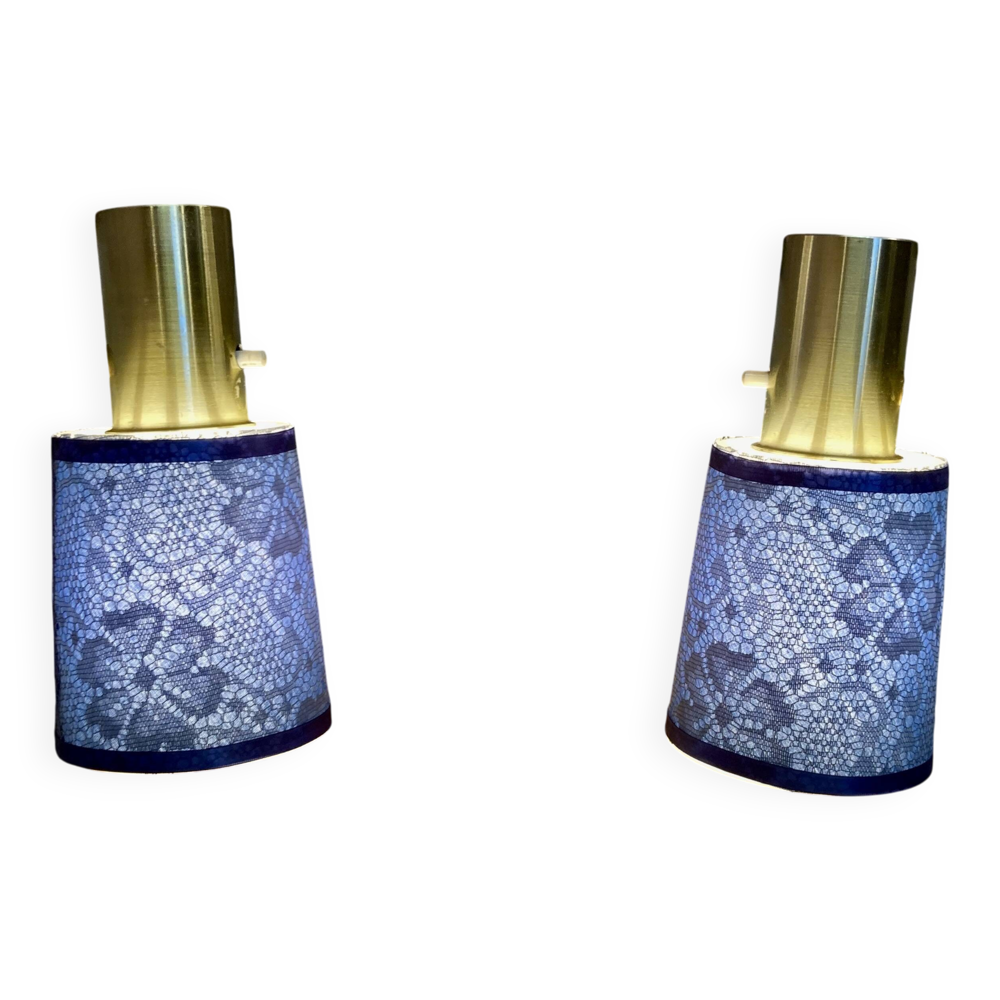 Pair of large modular industrial lamps from the 1950s.