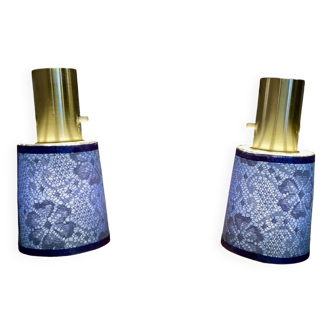 Pair of large modular industrial lamps from the 1950s.