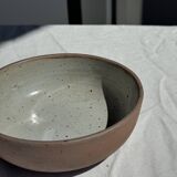 A speckled grey interior bowl with a matte brown exterior H5 D15